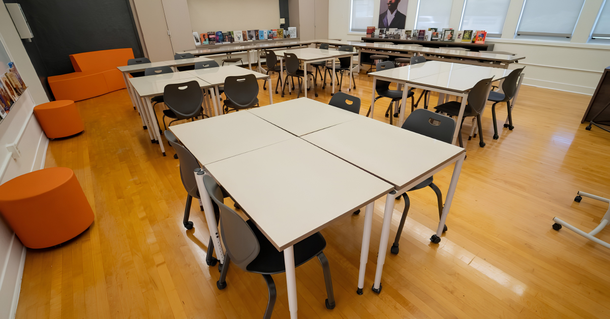 Education workspace with tables and chairs arranged for focused and collaborative work