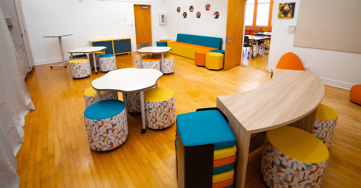 Flexible education workspace with collaborative seating and tables